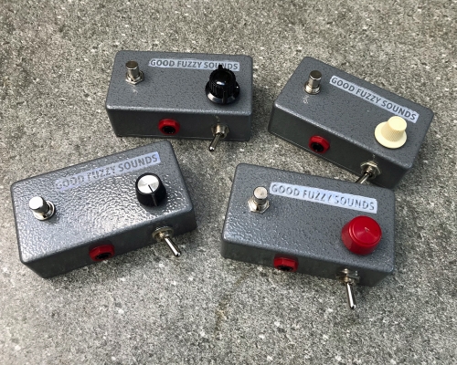 Four Good Fuzzy Sounds 2.Bad fuzz pedals with a moulded metal enclosure, two knobs in a variety of designs, a switch and hand-stamped graphics.